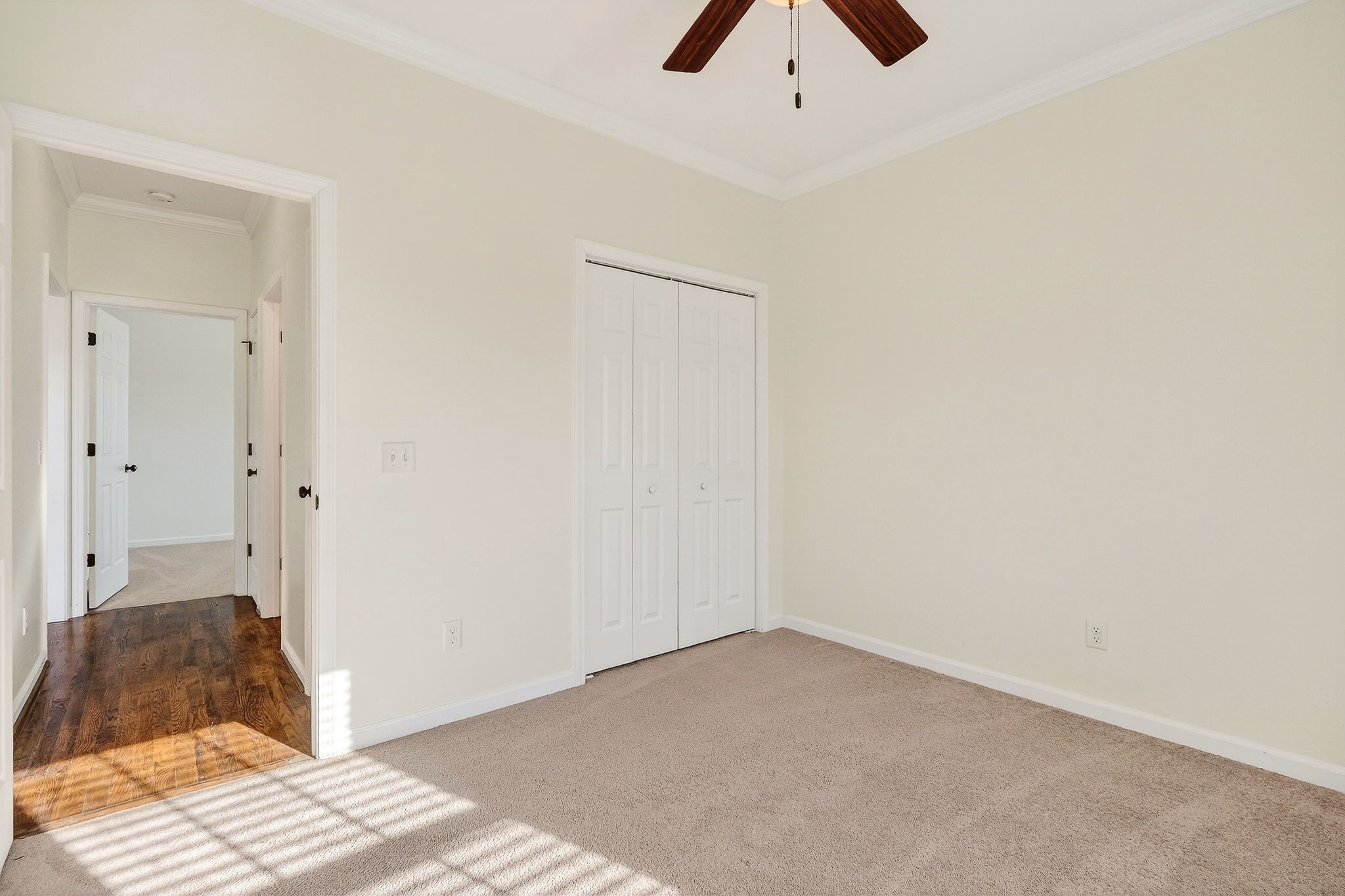 4029 Buffalo Valley Road Cookeville, TN 38501 - Photo 32 of 36 a room with a bed and a ceiling fan