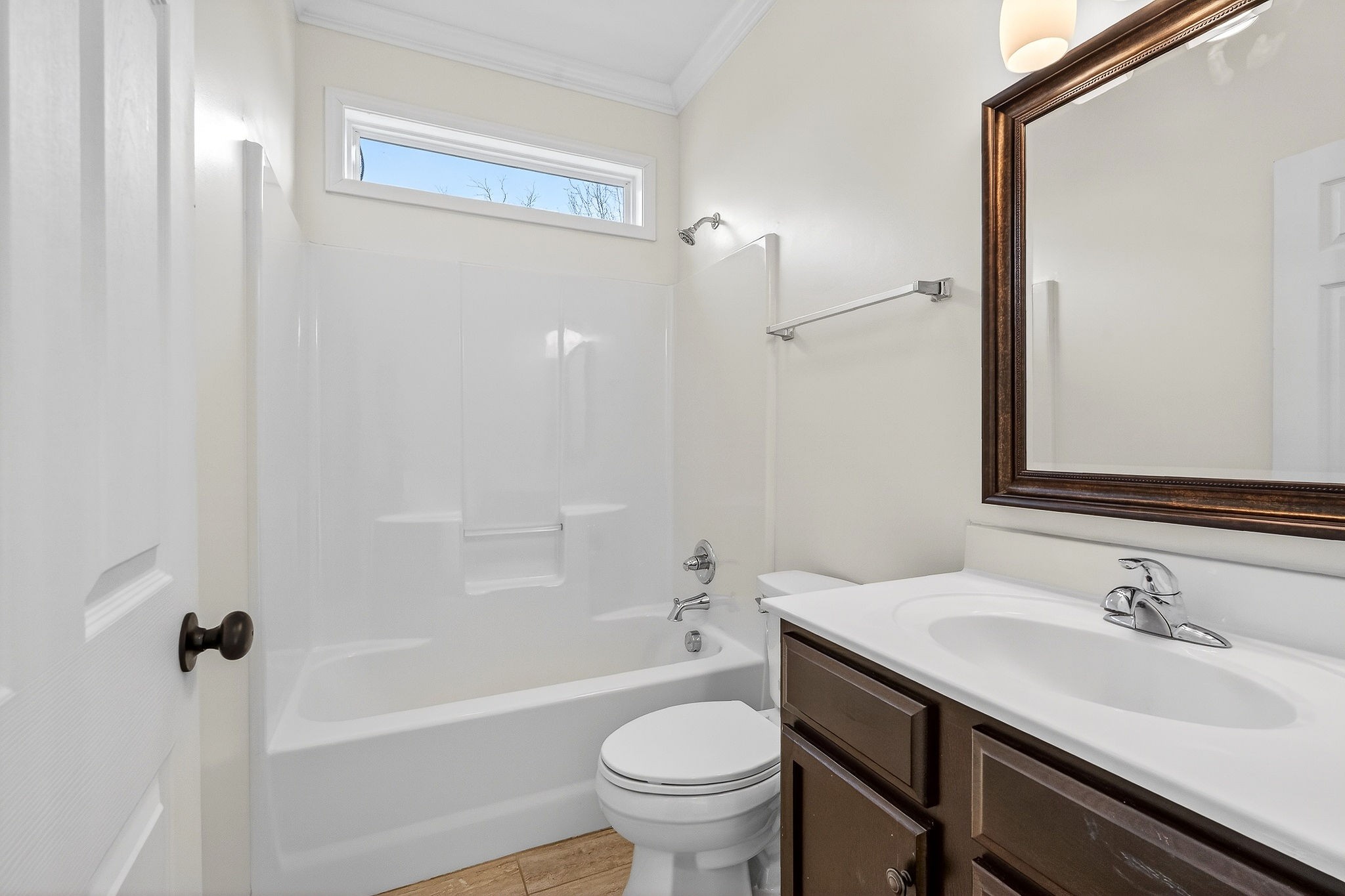 4029 Buffalo Valley Road Cookeville, TN 38501 - Photo 33 of 36 a bathroom with a sink a toilet and a mirror