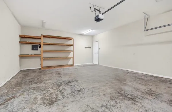 a view of room with a ceiling fan