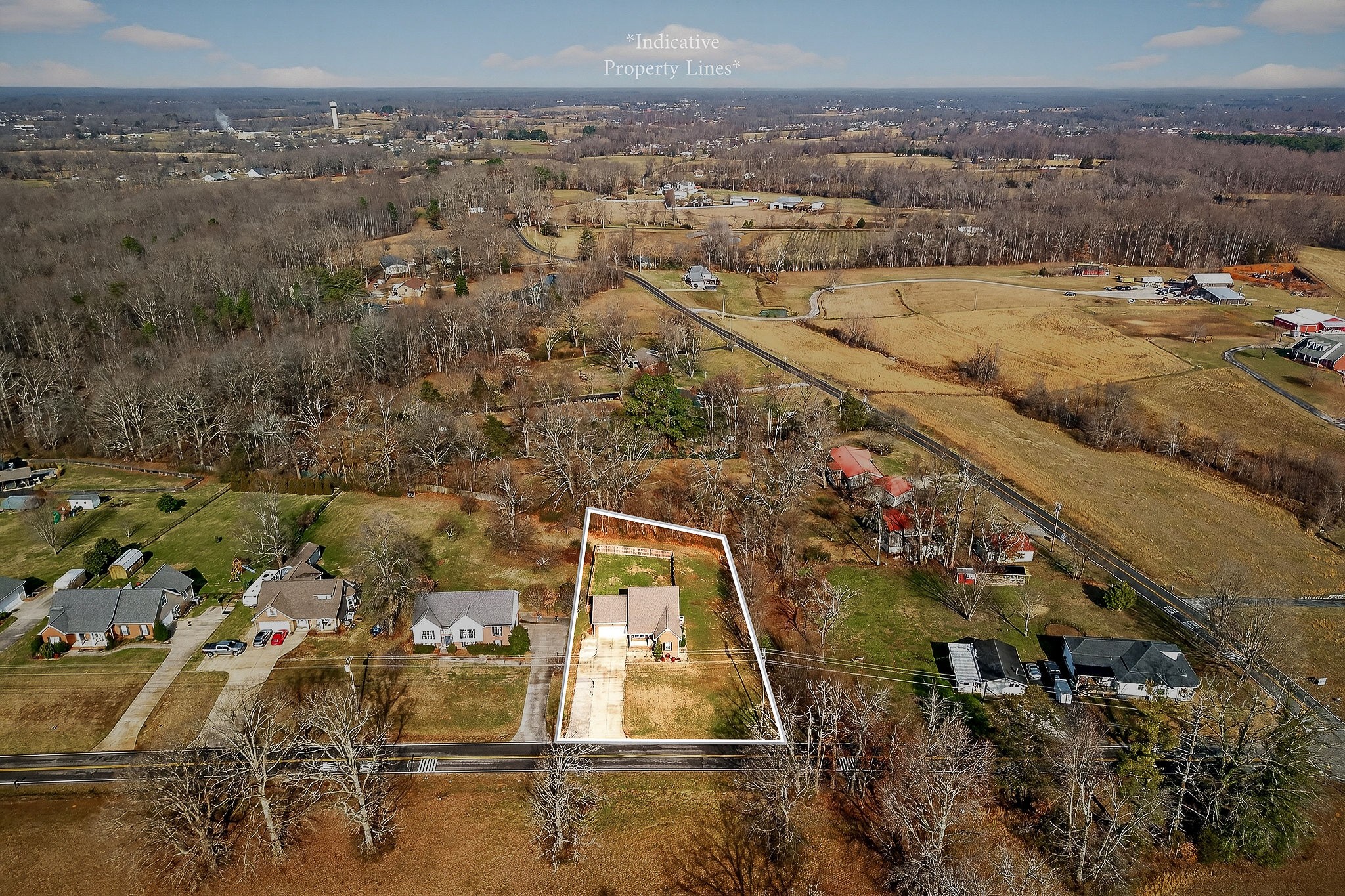 4029 Buffalo Valley Road Cookeville, TN 38501 - Photo 4 of 36 an aerial view of residential houses with outdoor space
