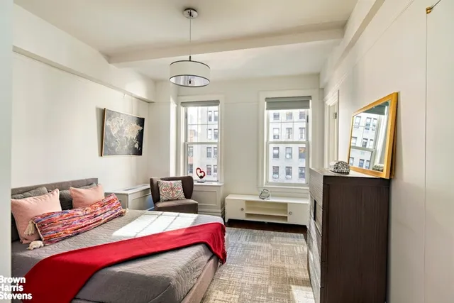 a bathroom with a shower and a toilet