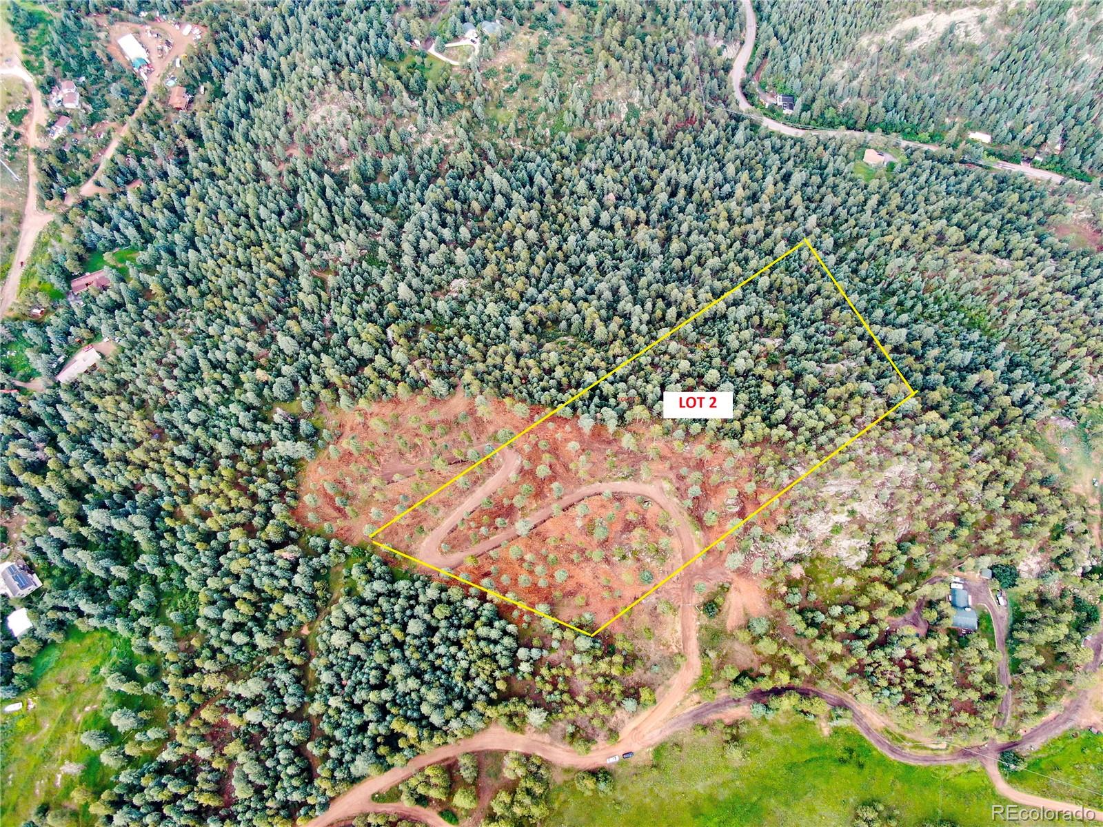 9206 Broken Bow Ranch Road Morrison, CO 80465 - Photo 1 of 15 view of outdoor space and garden view