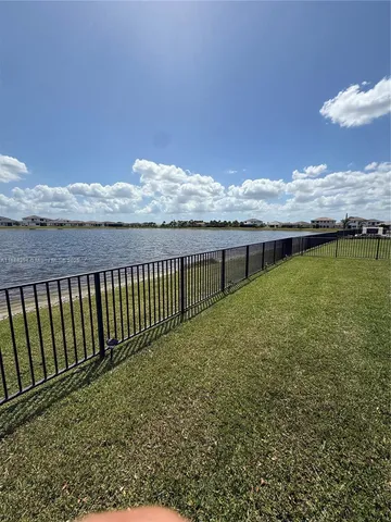 a view of a balcony with an ocean view