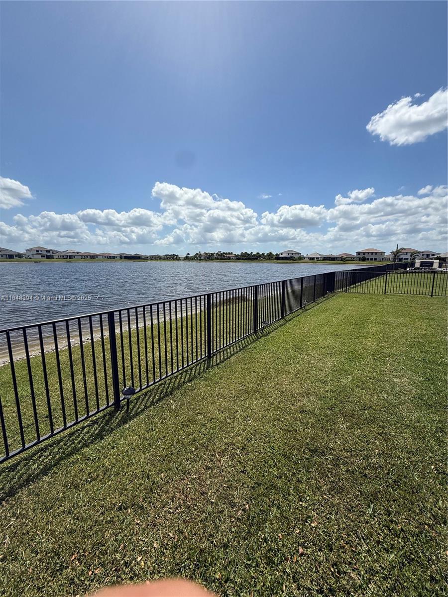 Maple Ridge Ave Maria, FL 34142 - Photo 5 of 5 a view of a balcony with an ocean view