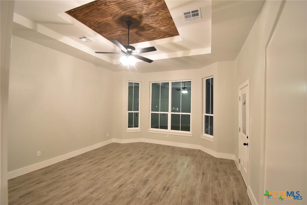 Tbd Tbd River Belton, TX 76513 - Photo 10 of 14 a view of an empty room with wooden floor and a window