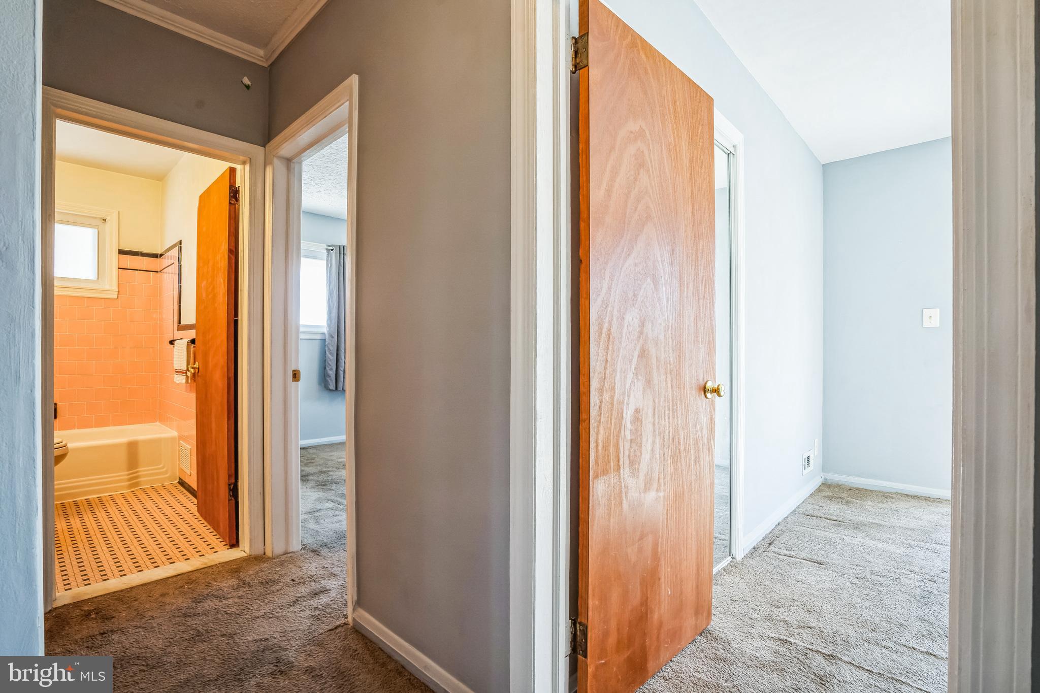 7911 35th Street Rosedale, MD 21237 - Photo 12 of 30 a view of hallway with livingroom and floor to ceiling window