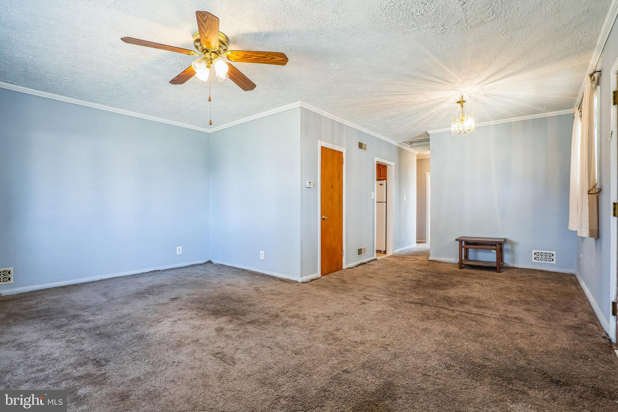 7911 35th Street Rosedale, MD 21237 - Photo 14 of 30 a view of a livingroom with a ceiling fan