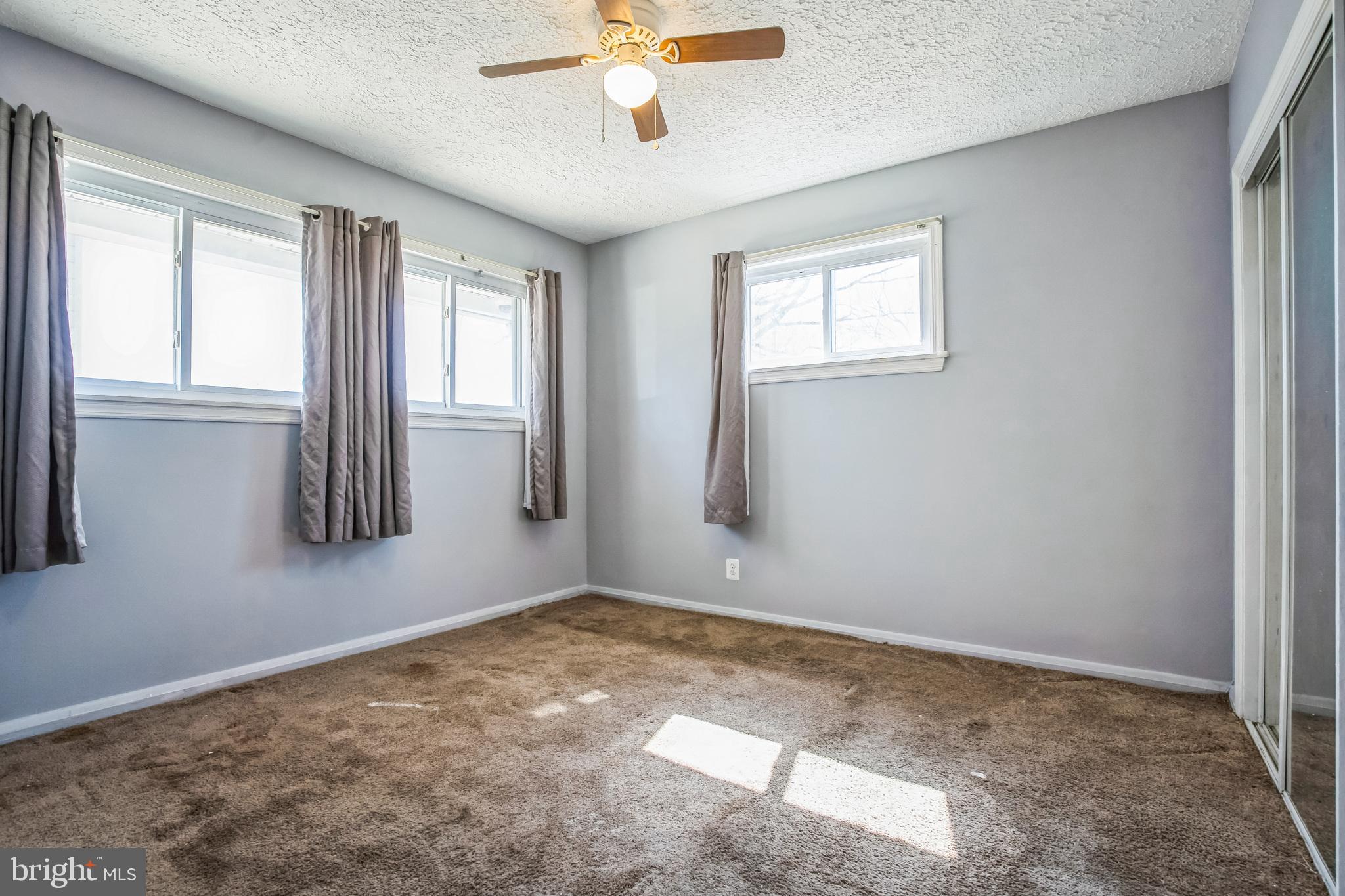 7911 35th Street Rosedale, MD 21237 - Photo 17 of 30 a view of an empty room with a window