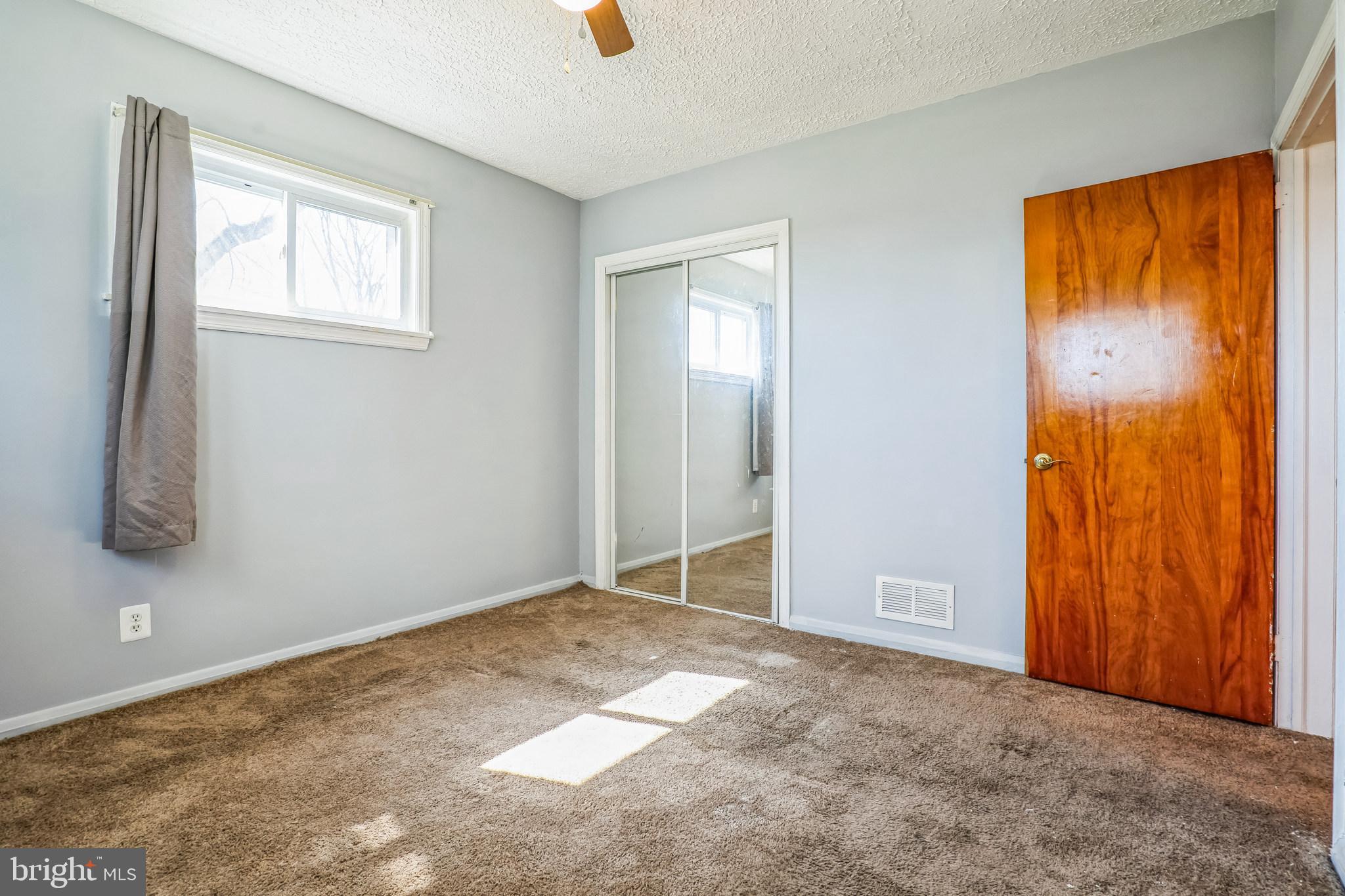 7911 35th Street Rosedale, MD 21237 - Photo 18 of 30 an empty room with windows