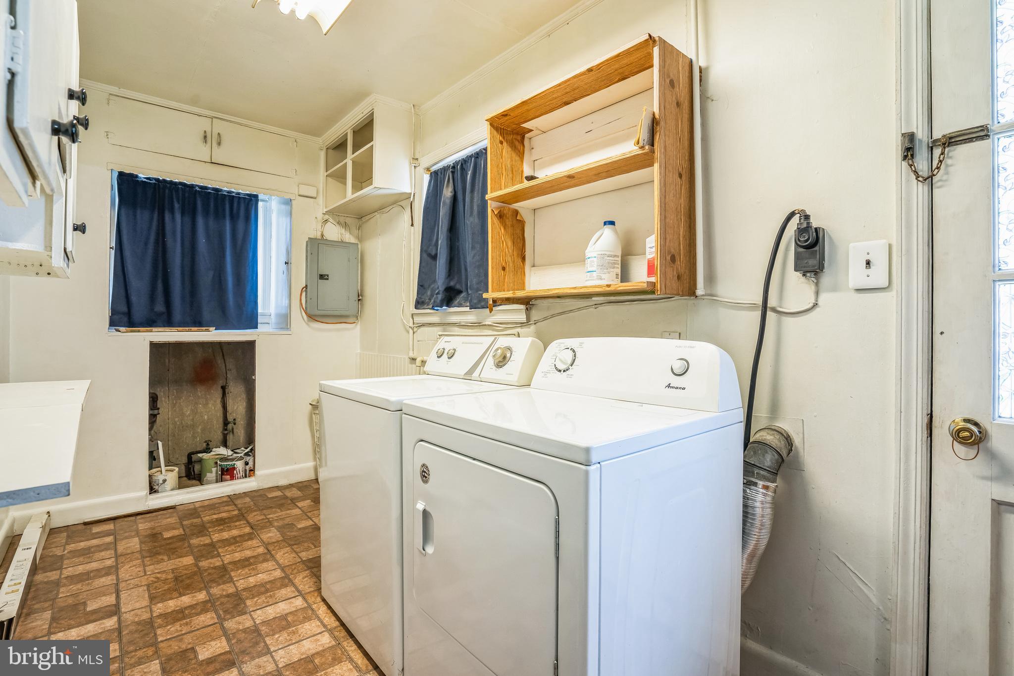 7911 35th Street Rosedale, MD 21237 - Photo 22 of 30 a utility room with closet dryer and washer