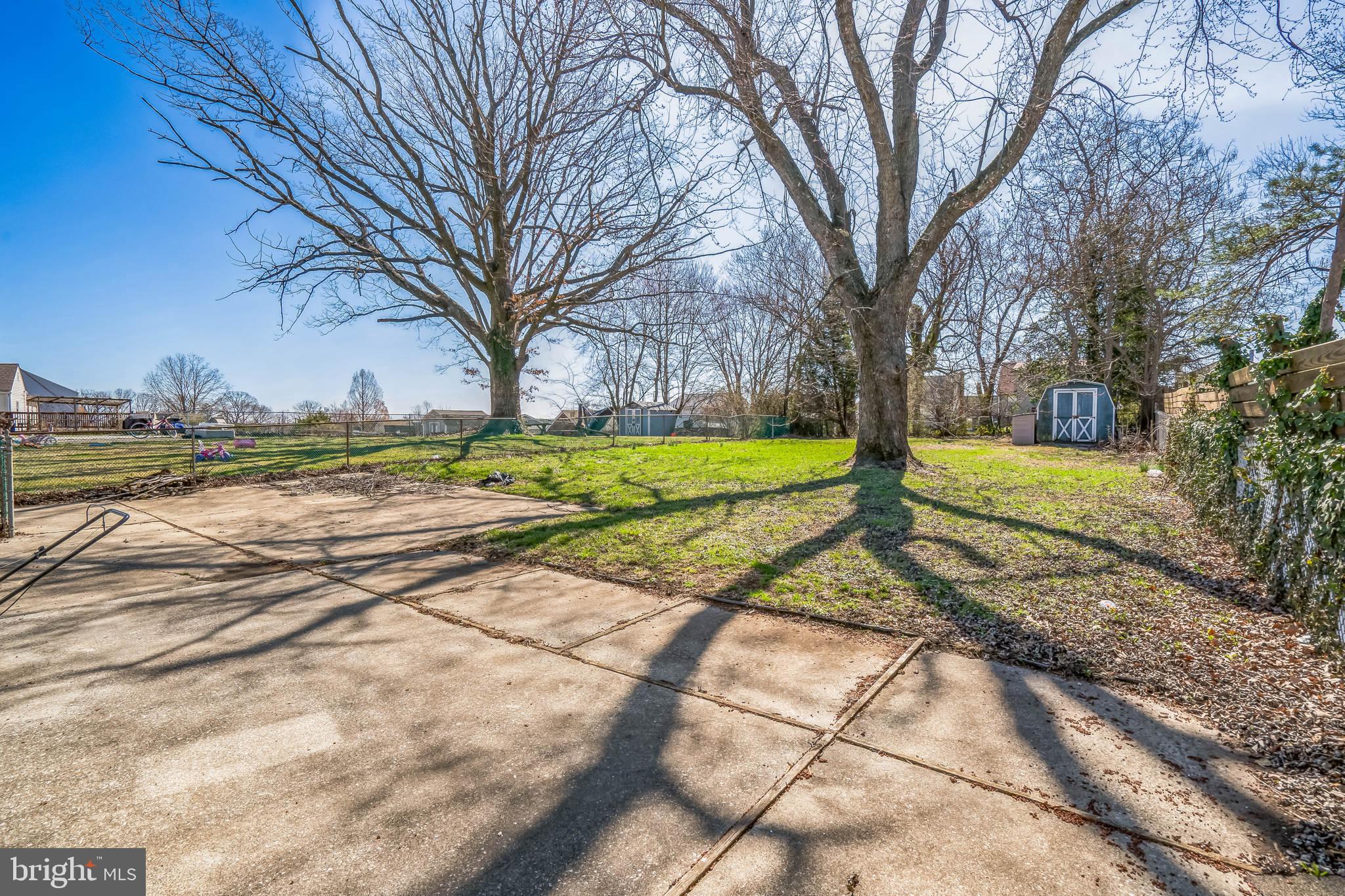 7911 35th Street Rosedale, MD 21237 - Photo 24 of 30 a view of a yard with an trees