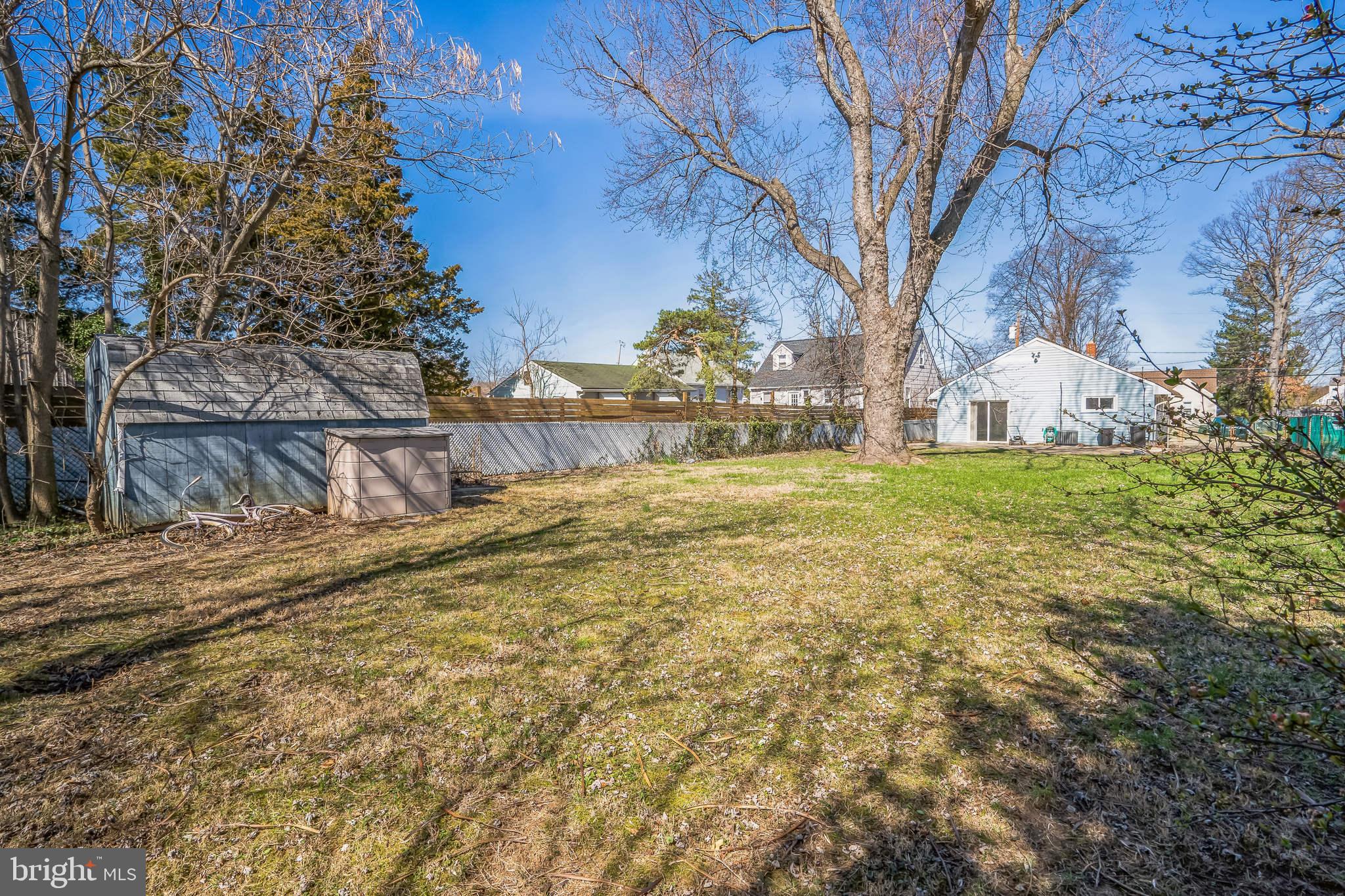 7911 35th Street Rosedale, MD 21237 - Photo 26 of 30 a view of a yard with large tree