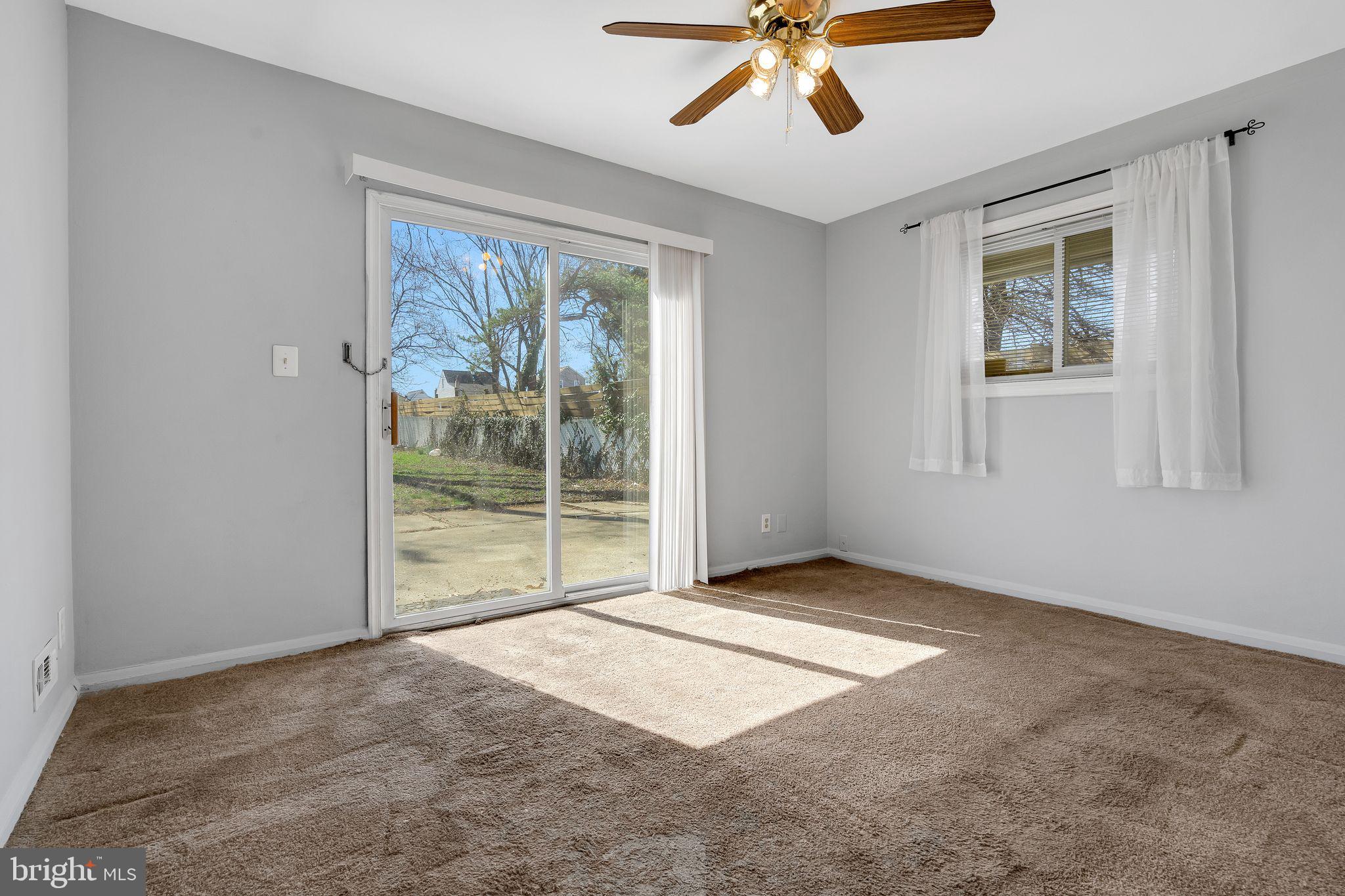 7911 35th Street Rosedale, MD 21237 - Photo 6 of 30 a view of an empty room with a window