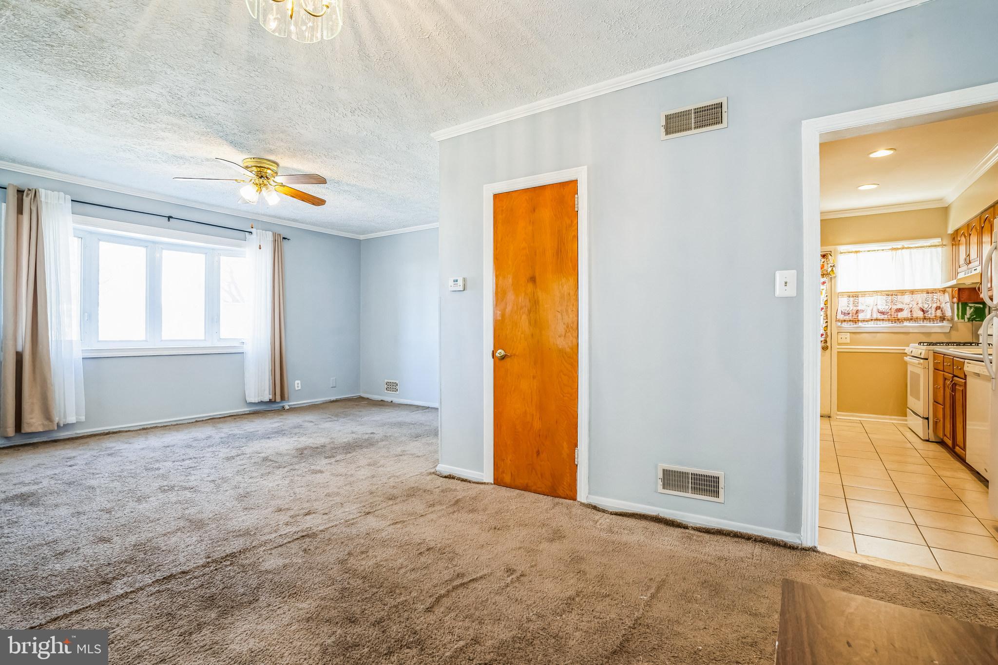 7911 35th Street Rosedale, MD 21237 - Photo 7 of 30 a view of an empty room and window