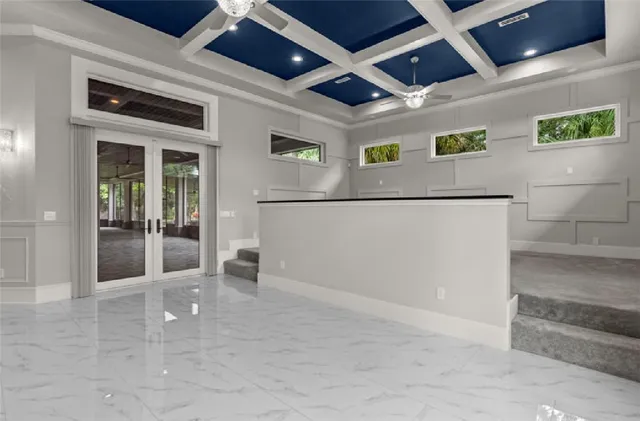 a kitchen with stainless steel appliances a sink stove and refrigerator