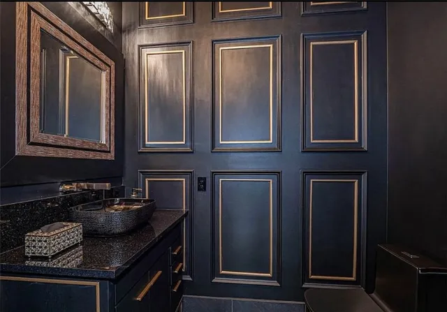 an aerial view of a house with yard and outdoor seating