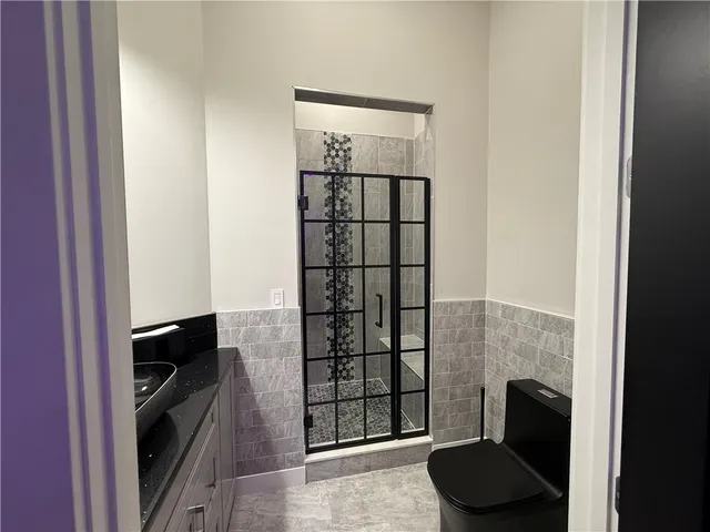 a view of a big yard with a table and chairs