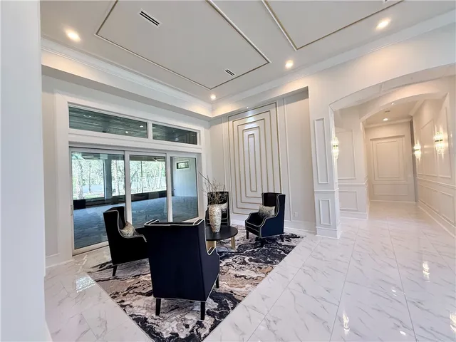 a view of a dining room with furniture window and outside view