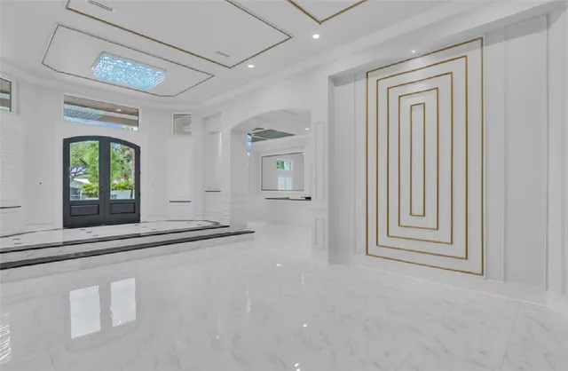 a kitchen with stainless steel appliances granite countertop a sink and a granite counter tops