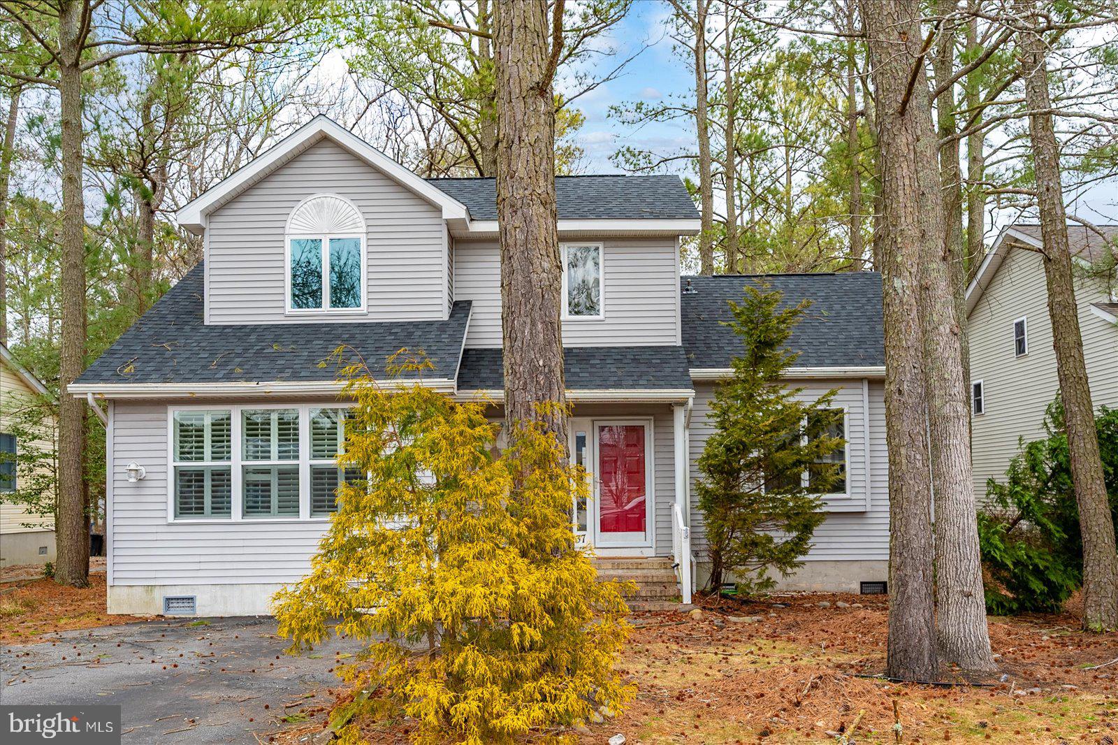 37 Watertown Road Ocean Pines, MD 21811 - Photo 6 of 86 front view of a house with a yard