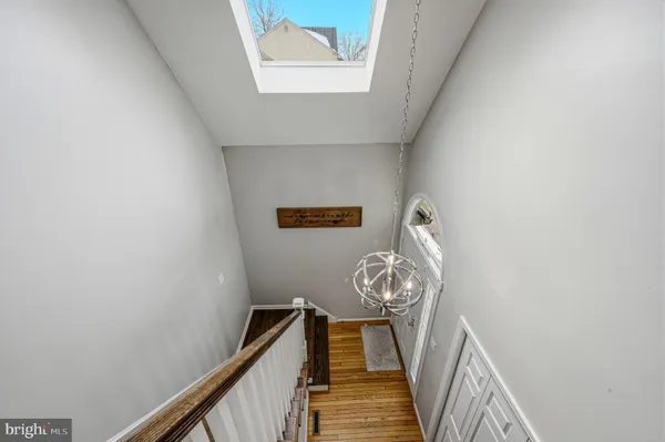a view of entryway with wooden floor