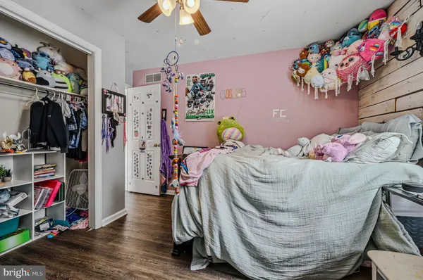 a bed room with a bed and a couch