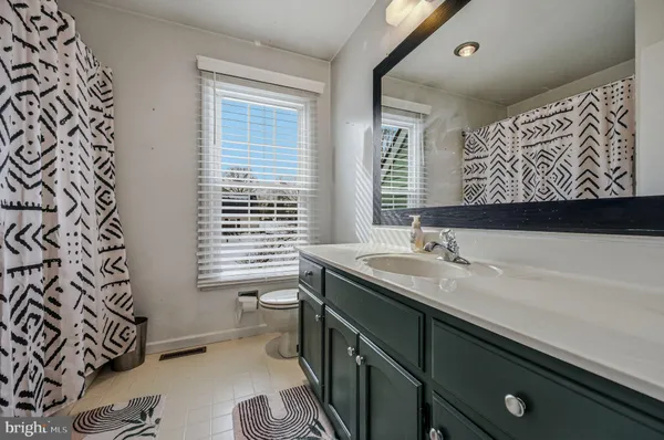 a kitchen with a sink and a window