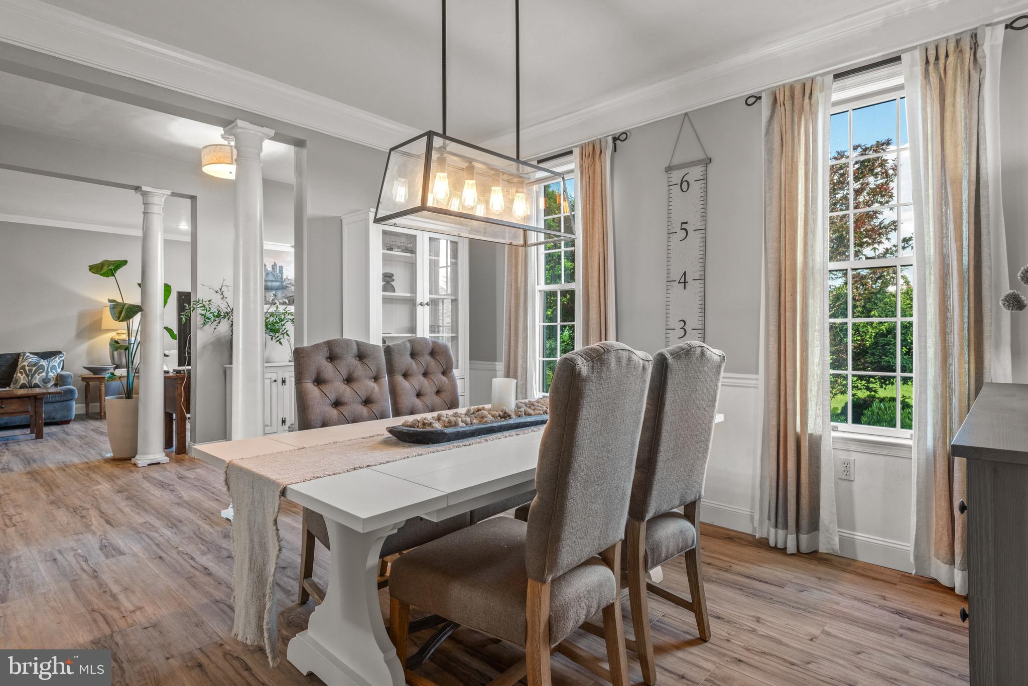 857 Church Road Lebanon, PA 17042 - Photo 12 of 43 a view of a dining room with furniture window and wooden floor