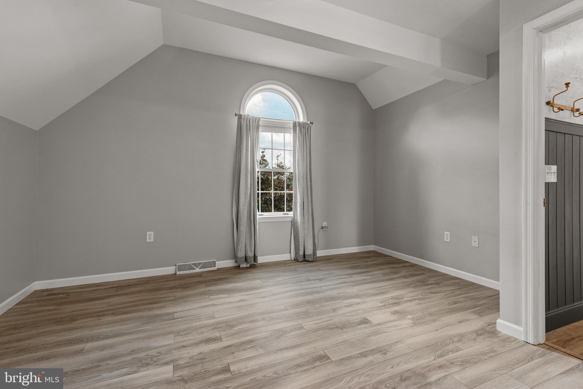 857 Church Road Lebanon, PA 17042 - Photo 25 of 43 an empty room with wooden floor and windows