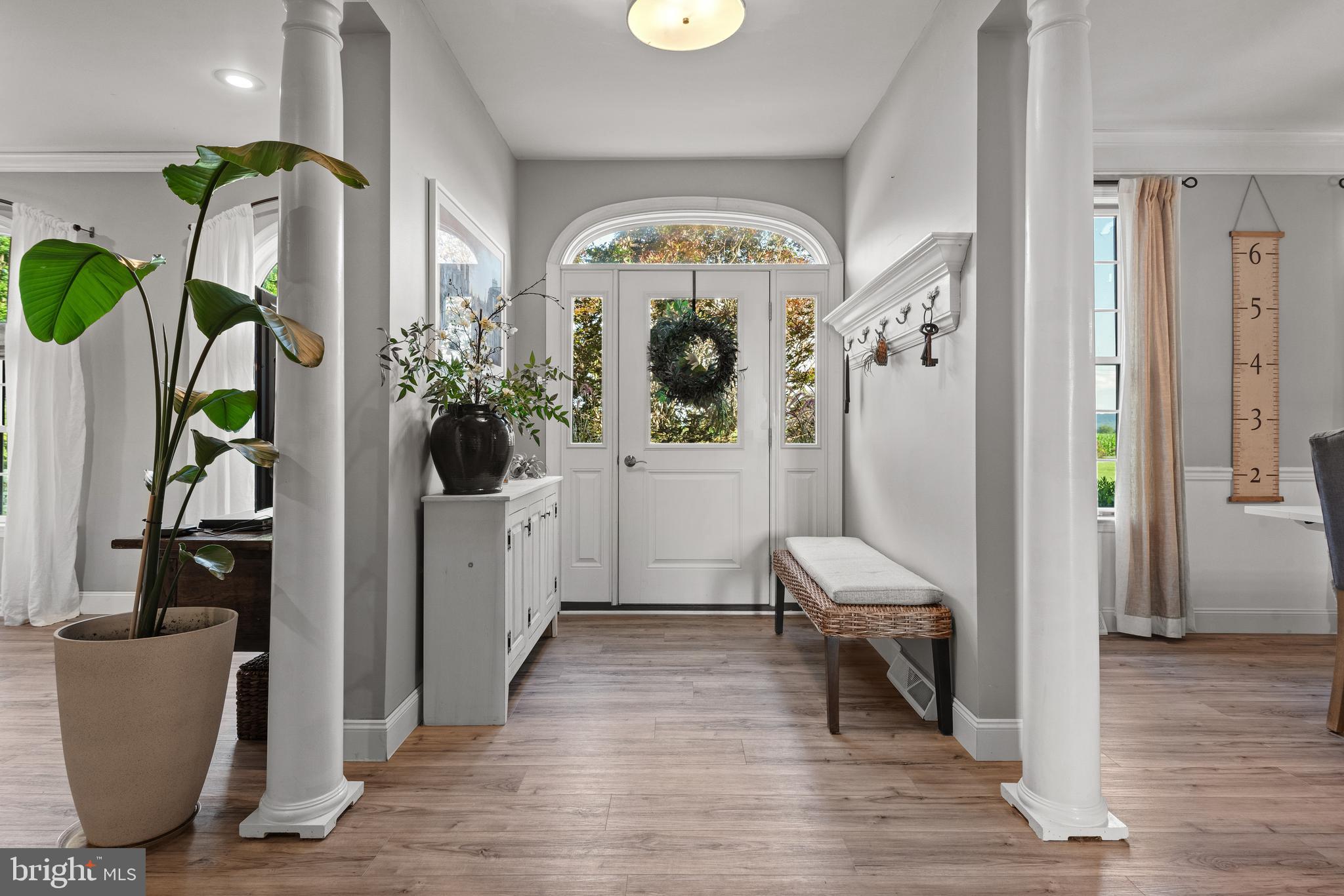 857 Church Road Lebanon, PA 17042 - Photo 7 of 43 a living room with furniture and a chandelier