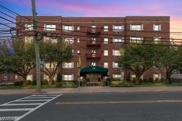 a view of a building with a street