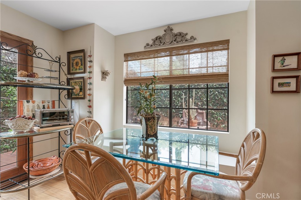333 Genoa Street, Unit 6 Arcadia, CA 91006 - Photo 10 of 40 a view of a dining room with furniture window and outside view