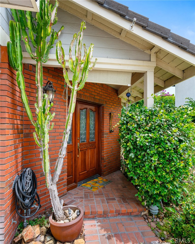 333 Genoa Street, Unit 6 Arcadia, CA 91006 - Photo 2 of 40 a vase of flowers sitting on a floor