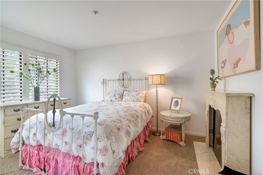333 Genoa Street, Unit 6 Arcadia, CA 91006 - Photo 27 of 40 a bedroom with a bed and a window