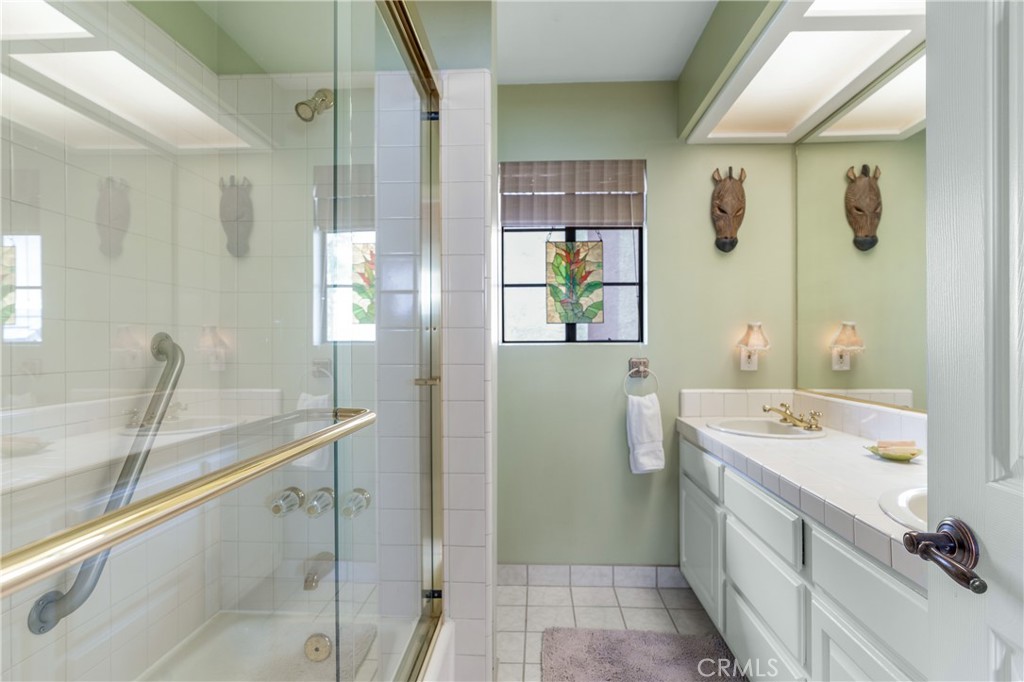 333 Genoa Street, Unit 6 Arcadia, CA 91006 - Photo 28 of 40 a bathroom with a sink and a mirror