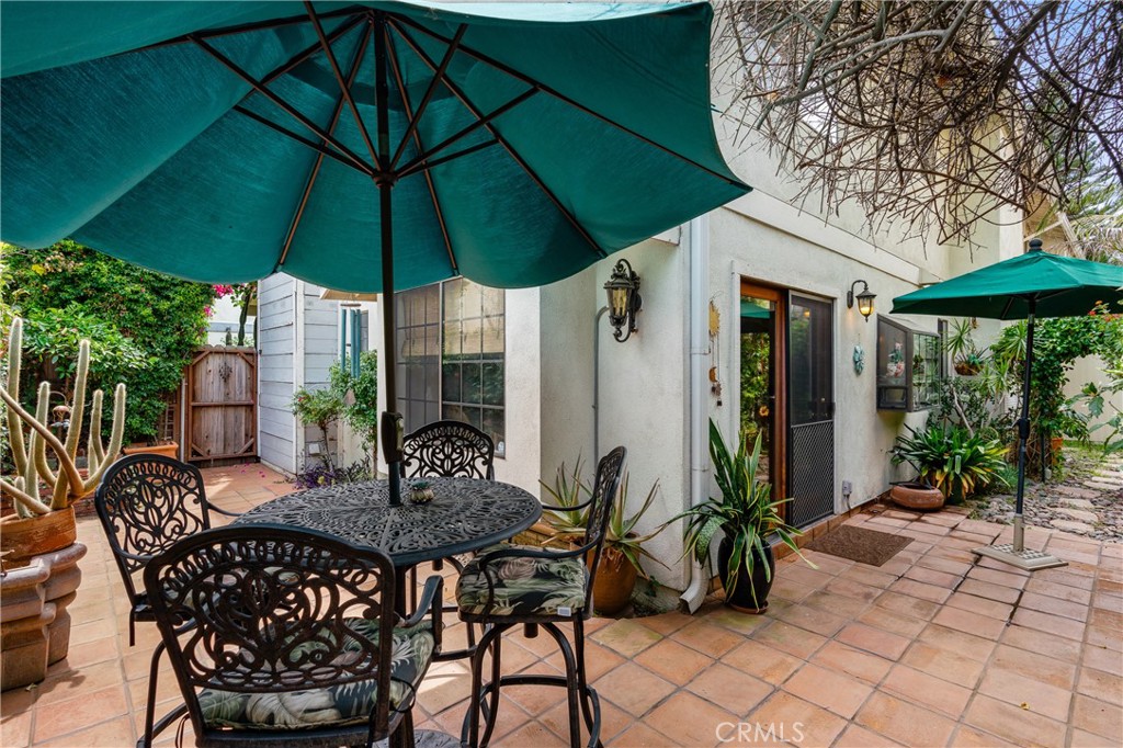 333 Genoa Street, Unit 6 Arcadia, CA 91006 - Photo 34 of 40 a view of an outdoor space with furniture and umbrella