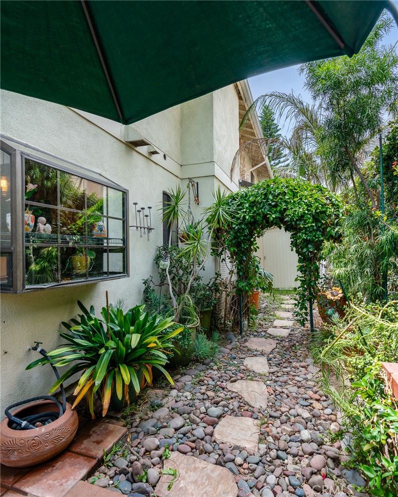333 Genoa Street, Unit 6 Arcadia, CA 91006 - Photo 36 of 40 a couple of potted plants sitting in front of a house