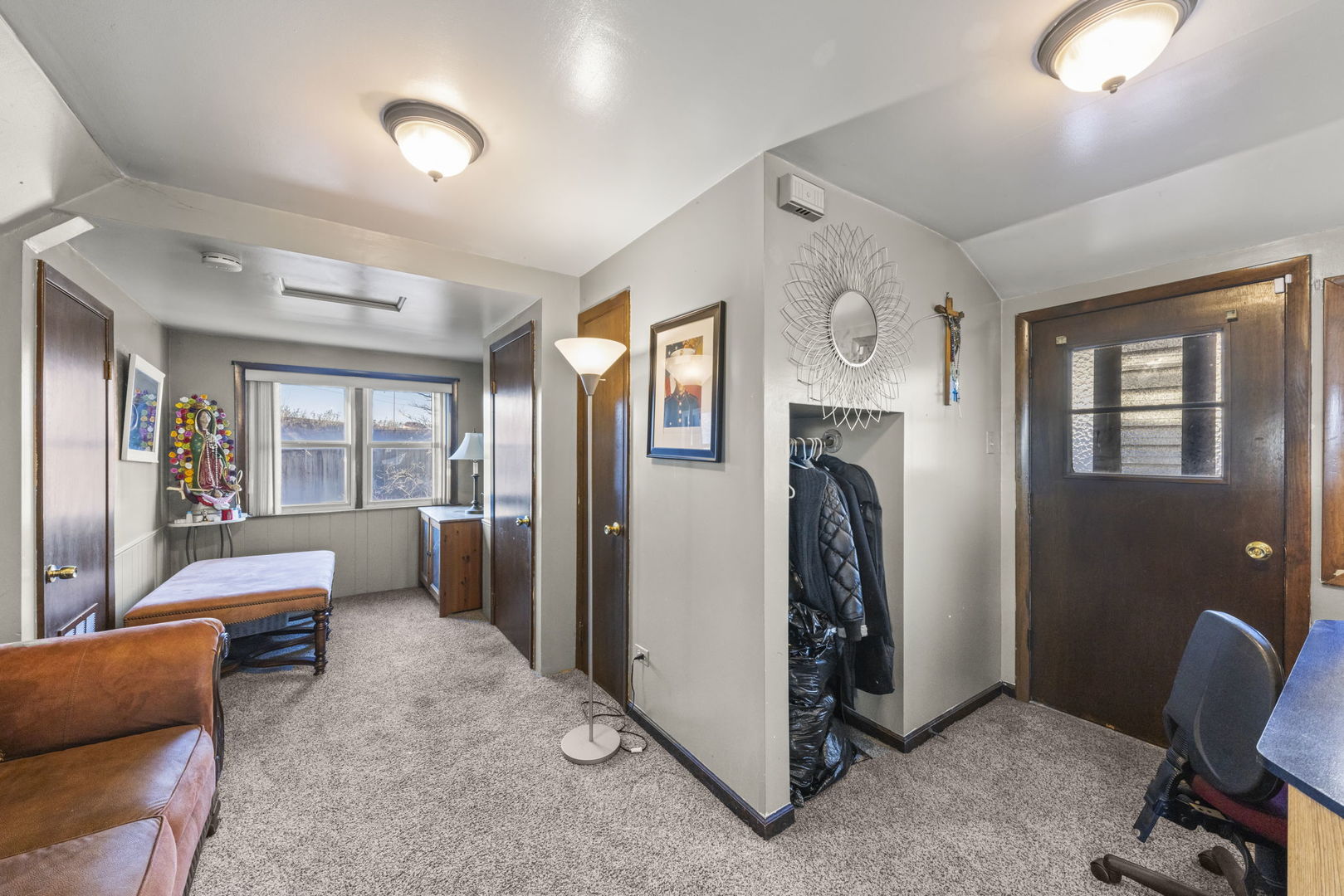 8440 Joliet Road McCook, IL 60525 - Photo 12 of 36 a view of livingroom with furniture and a flat screen tv
