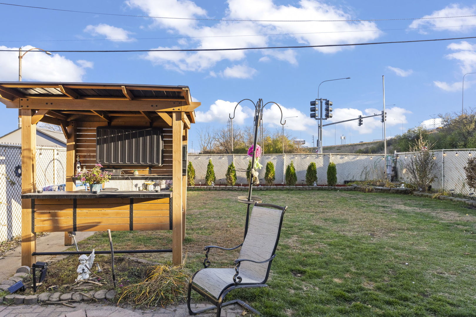 8440 Joliet Road McCook, IL 60525 - Photo 21 of 36 a view of a chairs and table in the patio