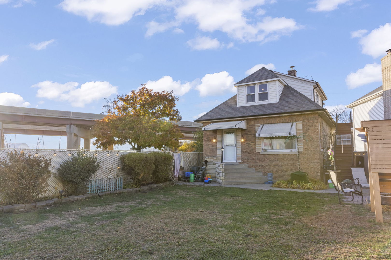 8440 Joliet Road McCook, IL 60525 - Photo 25 of 36 a front view of a house with garden