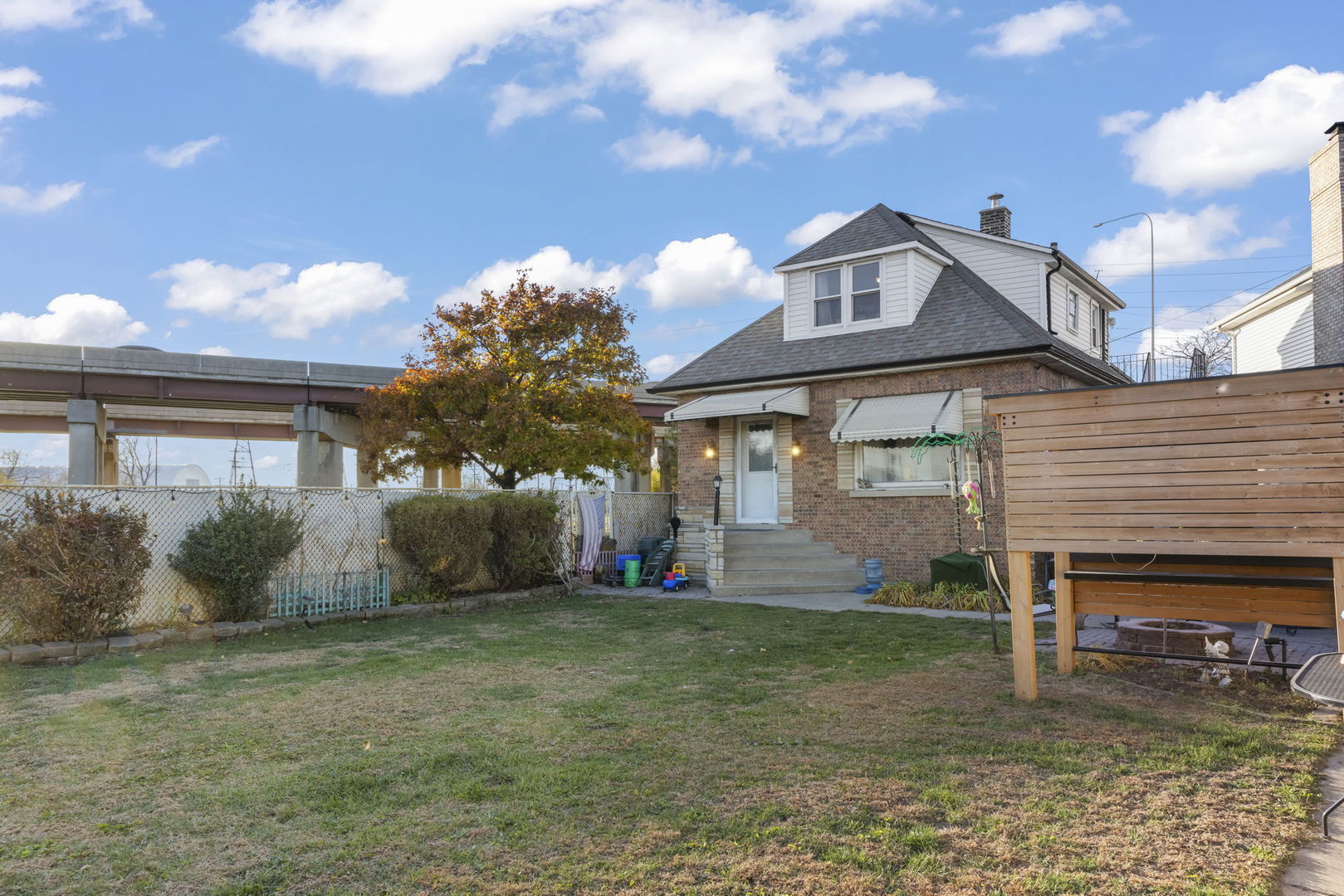 8440 Joliet Road McCook, IL 60525 - Photo 26 of 36 a front view of a house with garden