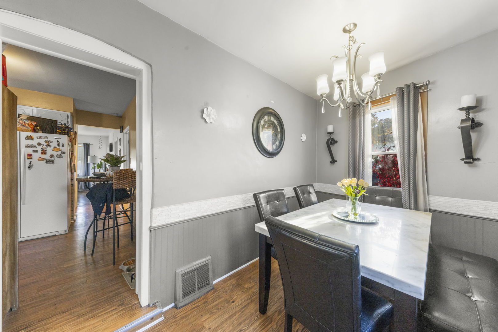 8440 Joliet Road McCook, IL 60525 - Photo 4 of 36 a view of a dining room with furniture and wooden floor