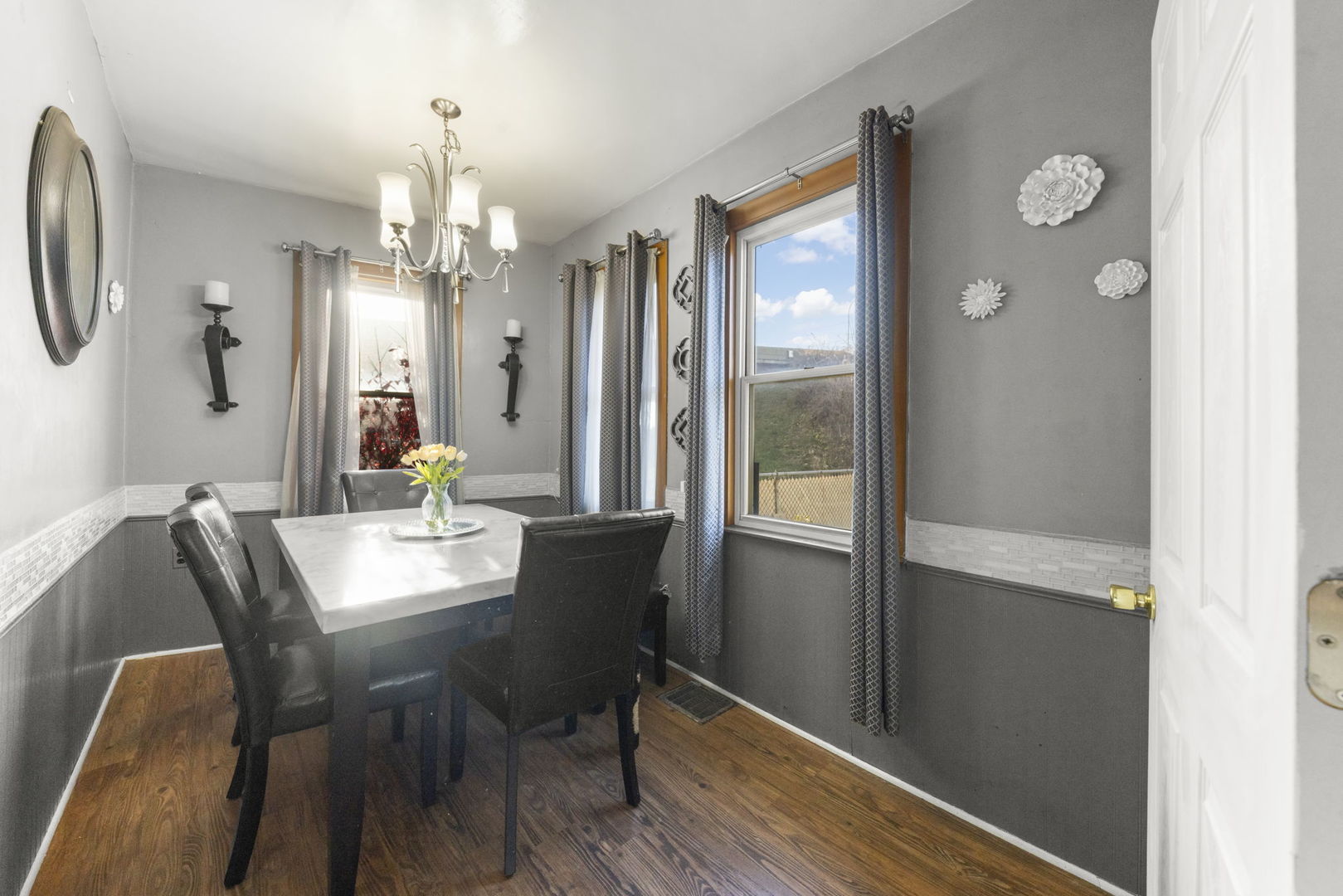8440 Joliet Road McCook, IL 60525 - Photo 5 of 36 a view of a dining room with furniture and wooden floor