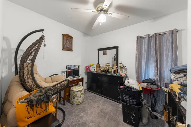 a room with furniture and wooden floor