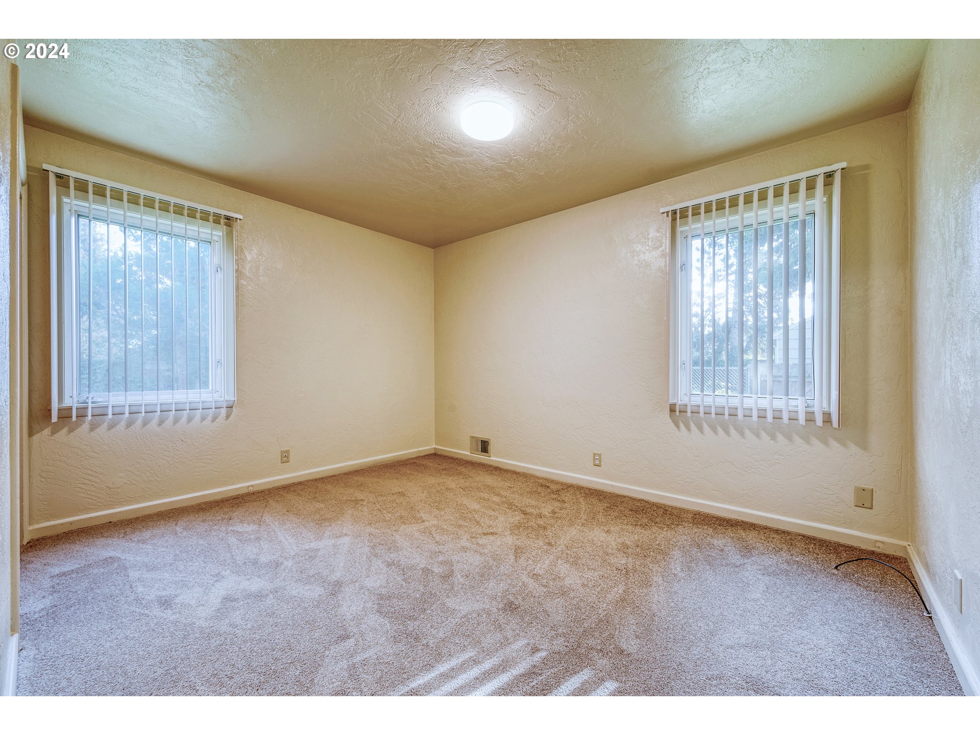 541 Waite Street Eugene, OR 97402 - Photo 13 of 25 a view of an empty room with a window