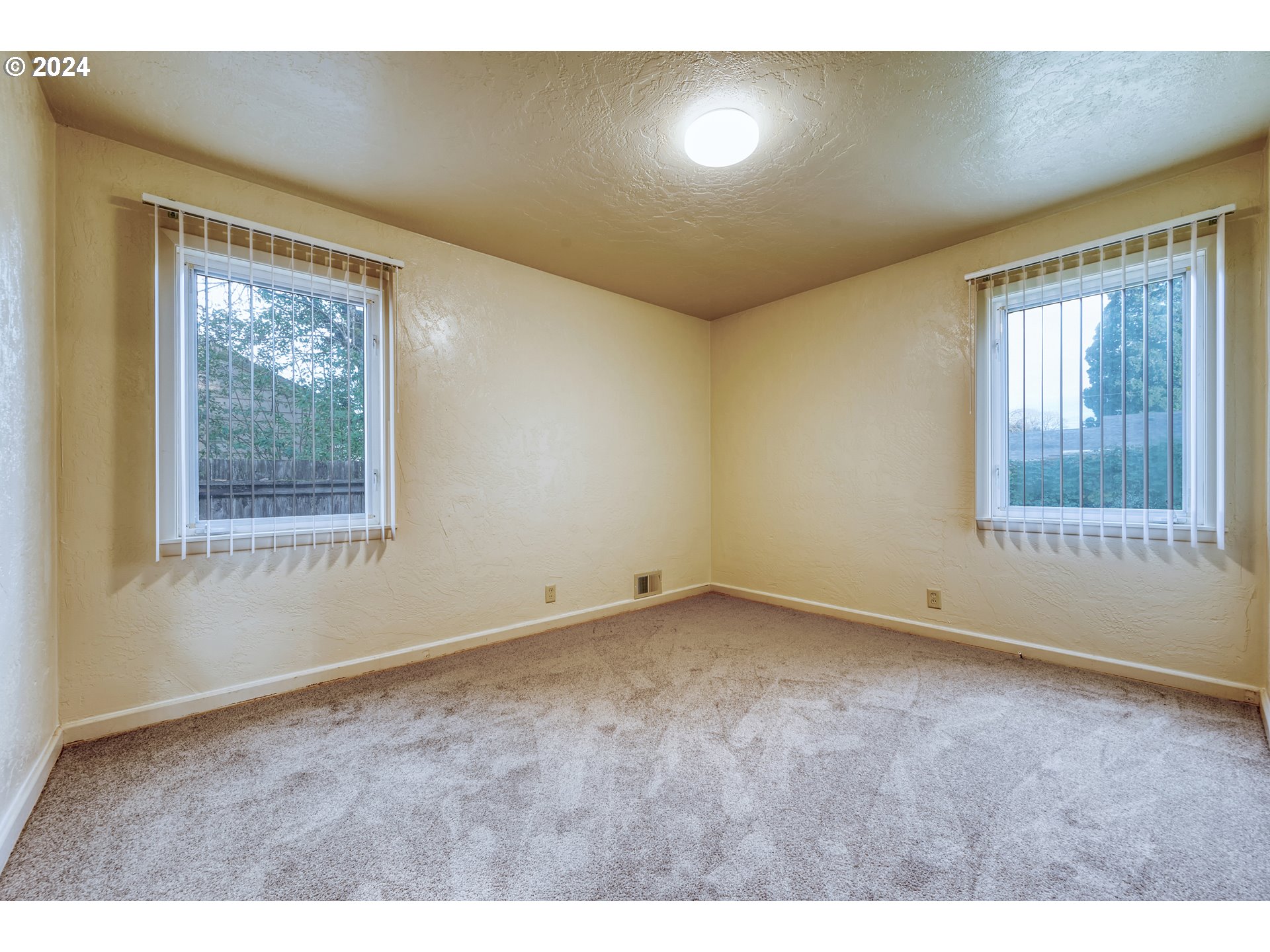 541 Waite Street Eugene, OR 97402 - Photo 16 of 25 a view of an empty room with a window