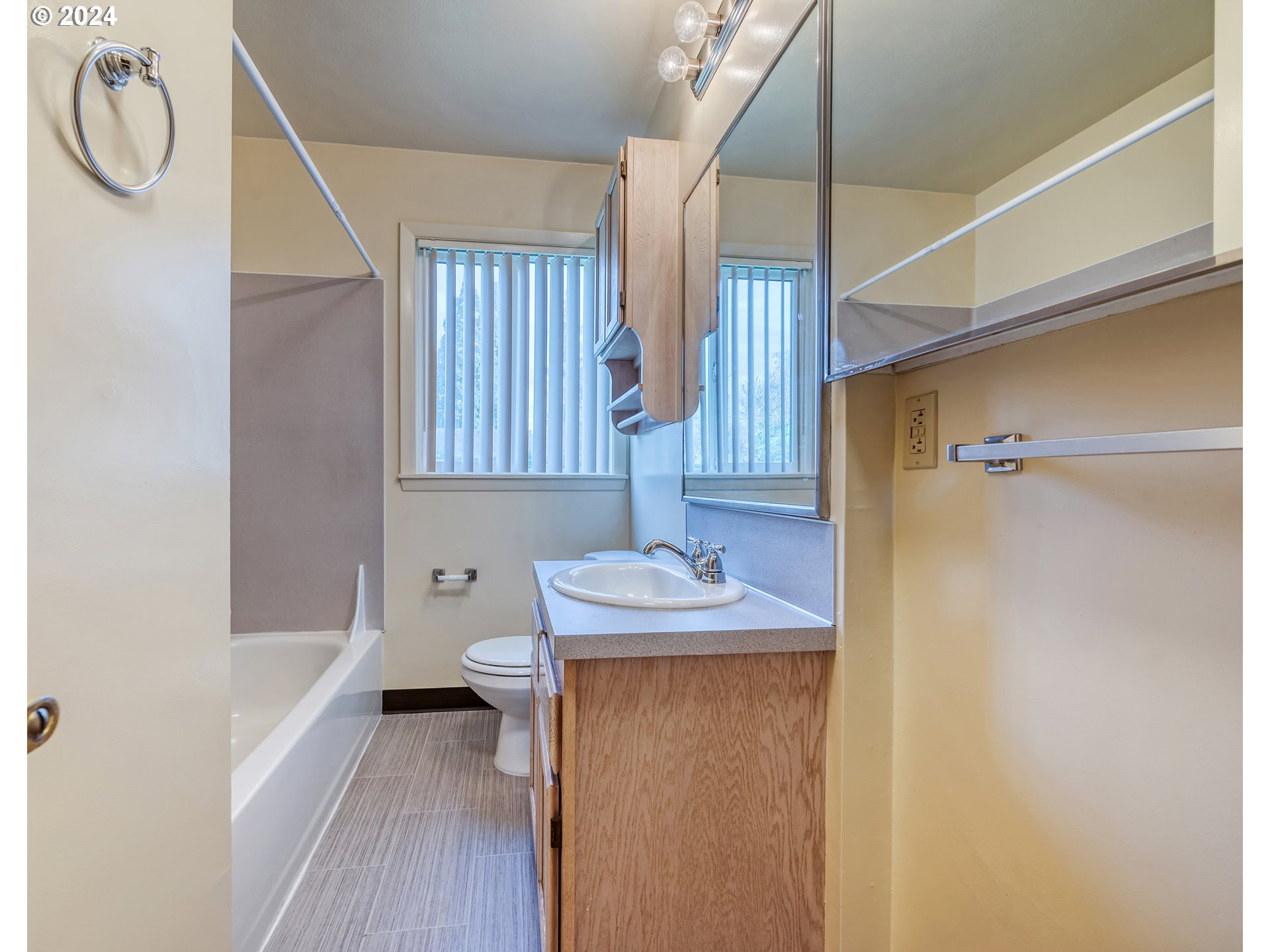 541 Waite Street Eugene, OR 97402 - Photo 17 of 25 a bathroom with a sink a toilet and shower