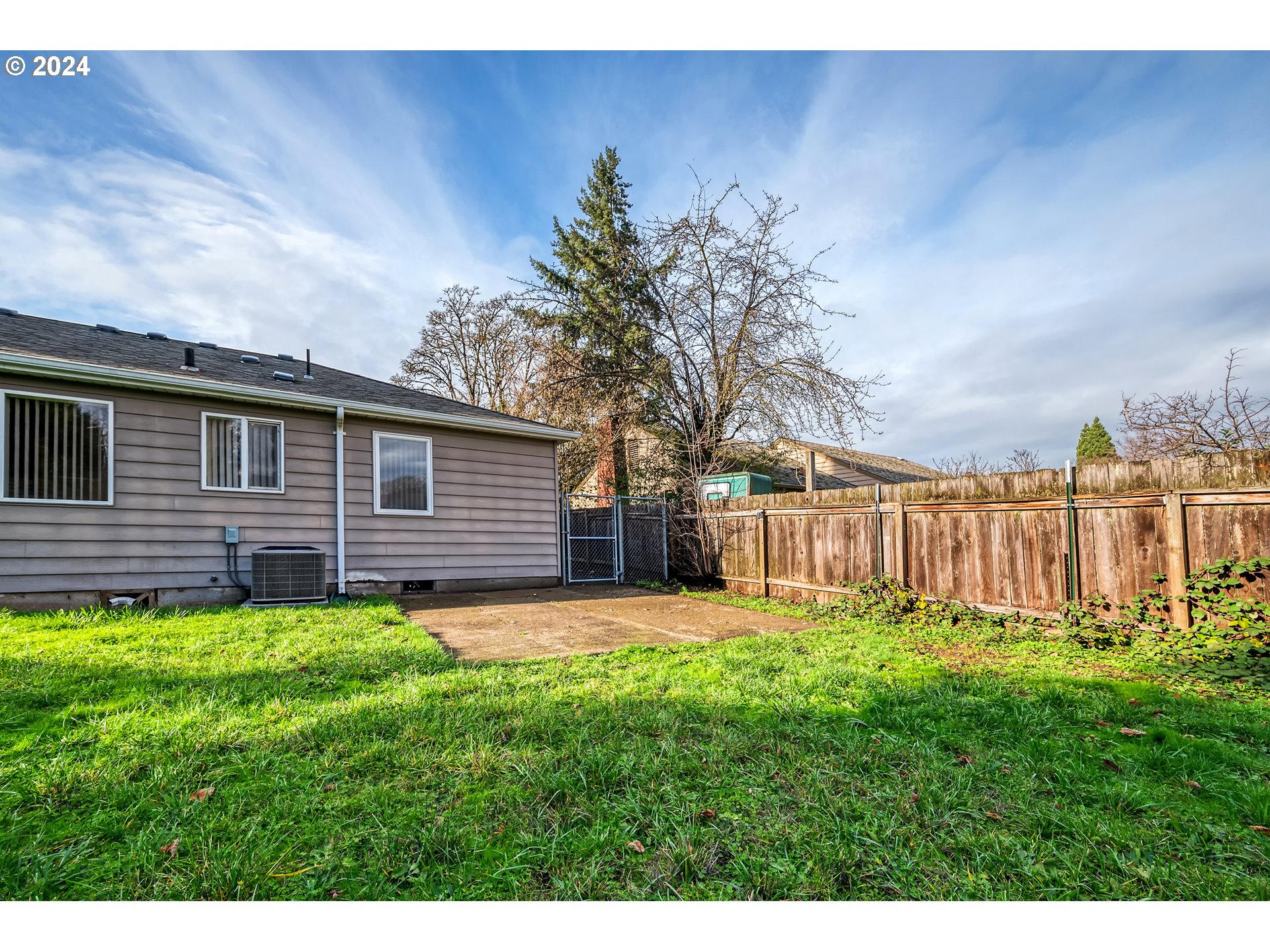 541 Waite Street Eugene, OR 97402 - Photo 22 of 25 a backyard of a house with lots of green space