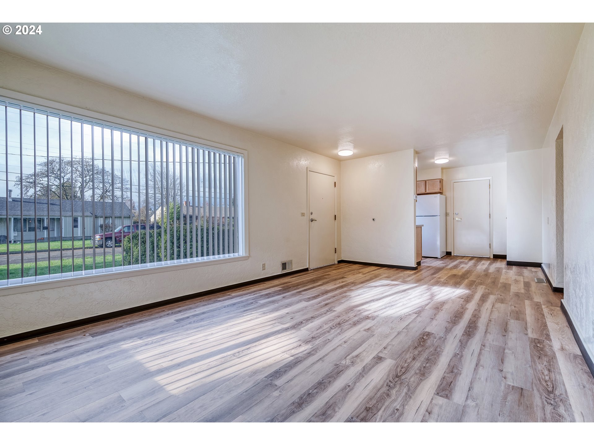 541 Waite Street Eugene, OR 97402 - Photo 5 of 25 a view of empty room with wooden floor
