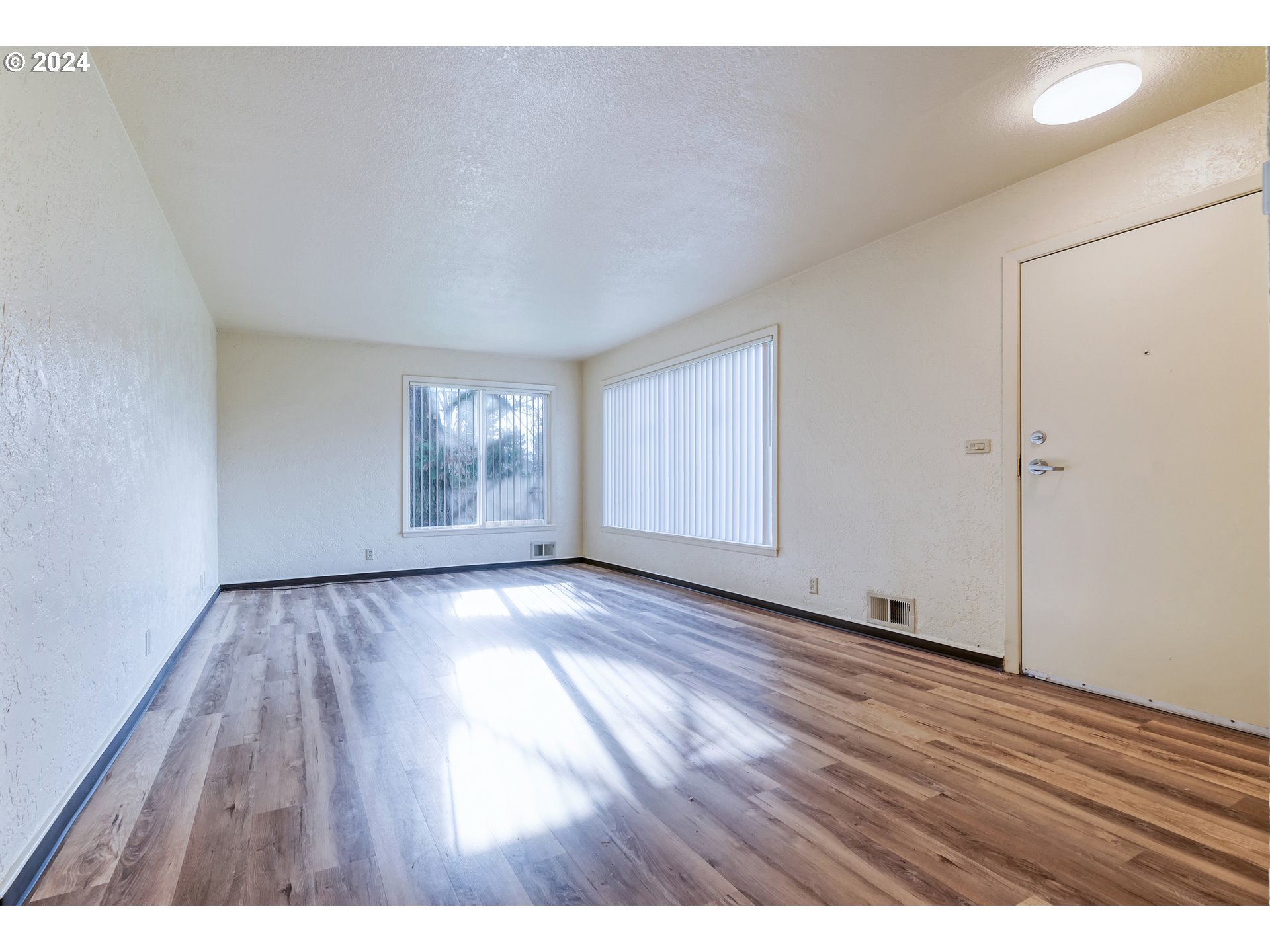 541 Waite Street Eugene, OR 97402 - Photo 6 of 25 a view interior of house with wooden floor